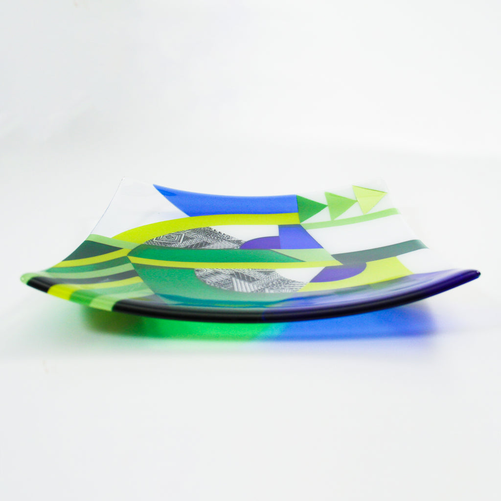 How does a fused glass bowl get its curve?