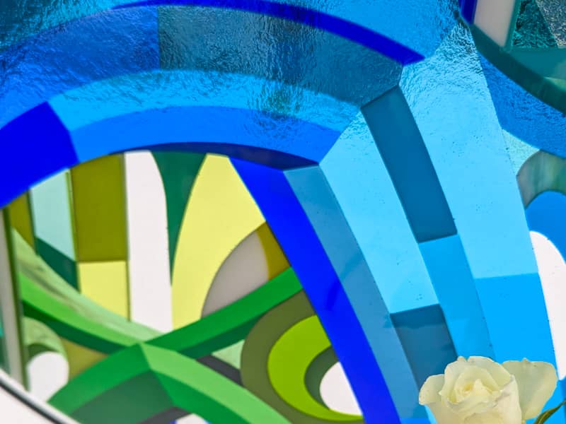 Never commissioned art before: Abstract design with blue, green, and yellow colours on a white background