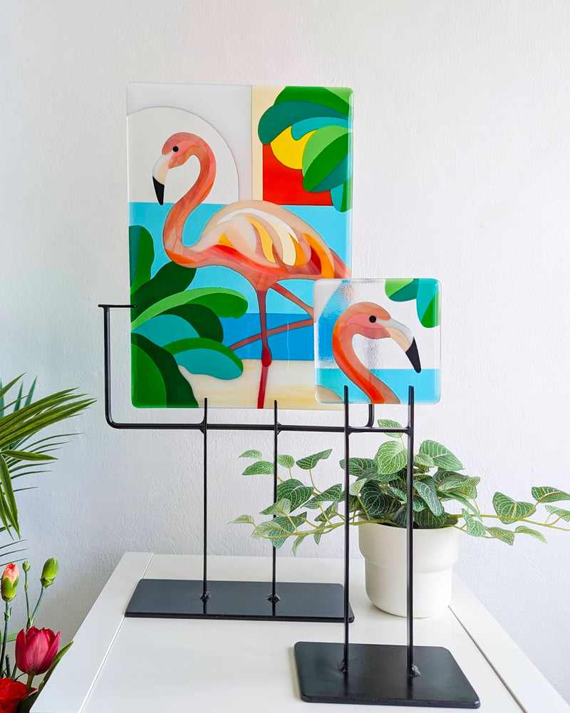 'Flamboyance' fused glass art - Fused glass flamingos on stands with tropical background