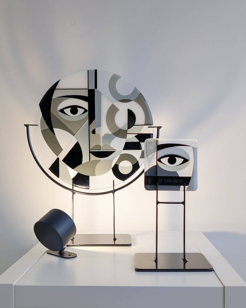 Commissioned contemporary glass Miniature displayed alongside its matching large Mono Lisa glass artwork by Linda Rossiter