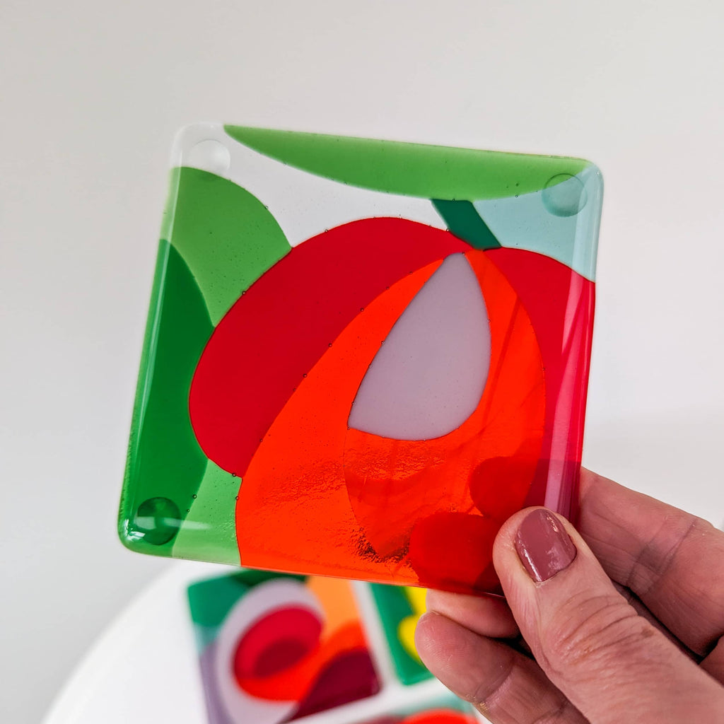 A set of 4 fused art glass Miniatures in a floral theme