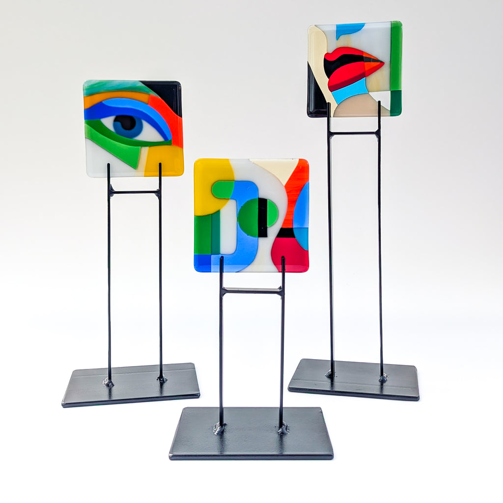 Fused glass "J" on steel stand