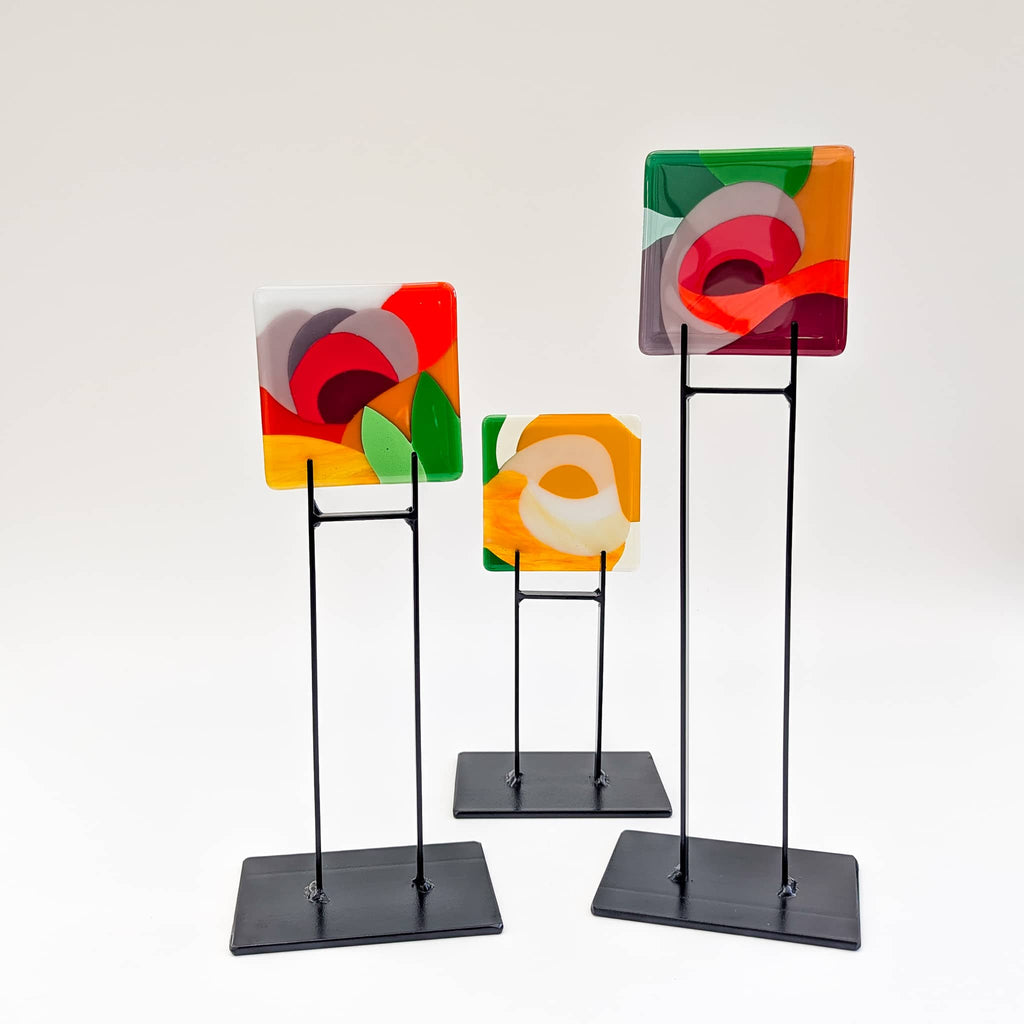 A set of 4 fused art glass Miniatures in a floral theme