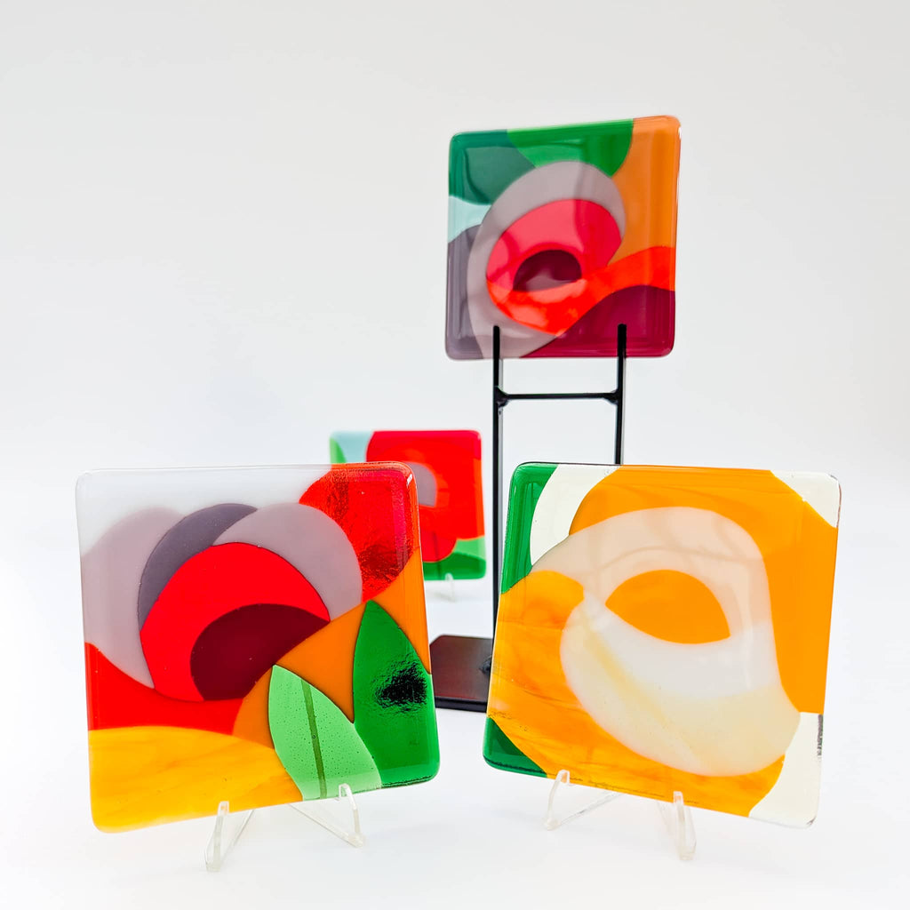 A set of 4 fused art glass Miniatures in a floral theme