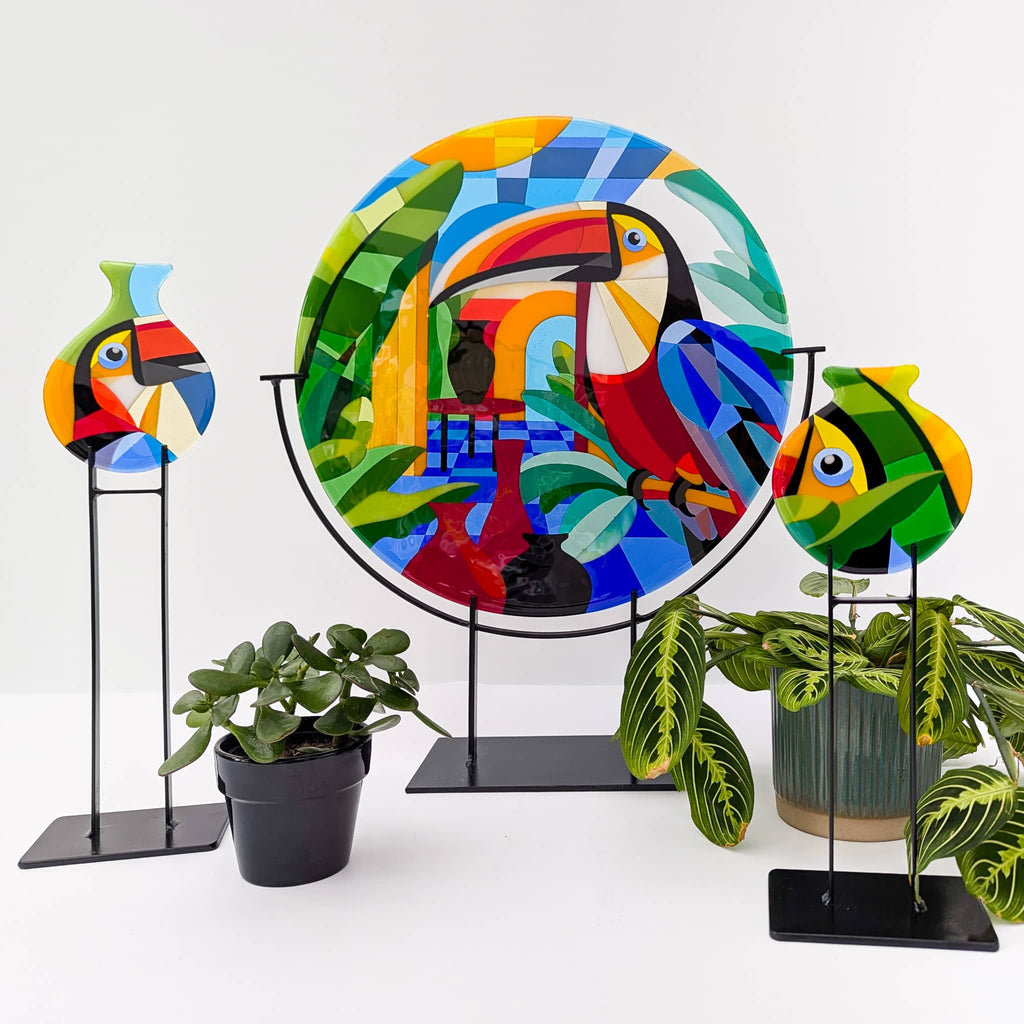 Toucans: Fused glass art roundel in the Hard Edge glass art style. Complete with 2 fused glass art miniatures on steel stands