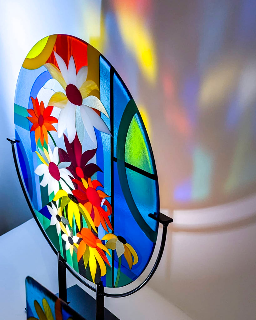 Coloured spotlight on Abundance: Large round fused glass art collection