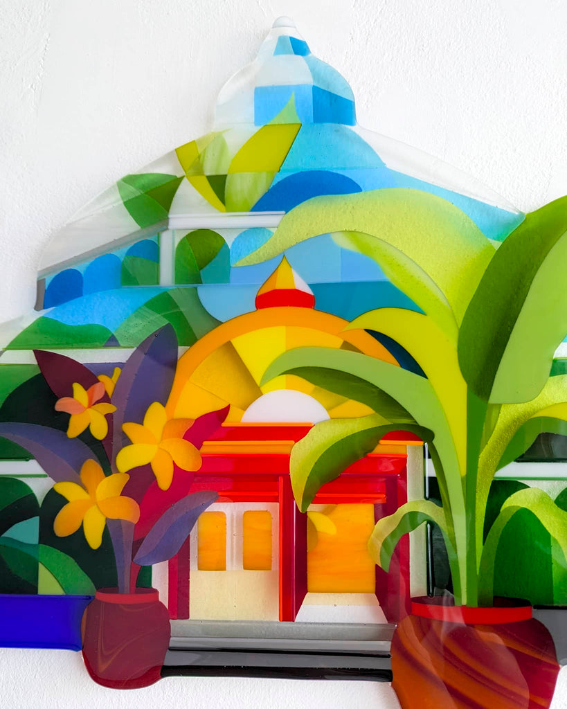 Hard Edge fused glass panel artwork with tropical plants and colourful building design, bespoke contemporary glass art commission