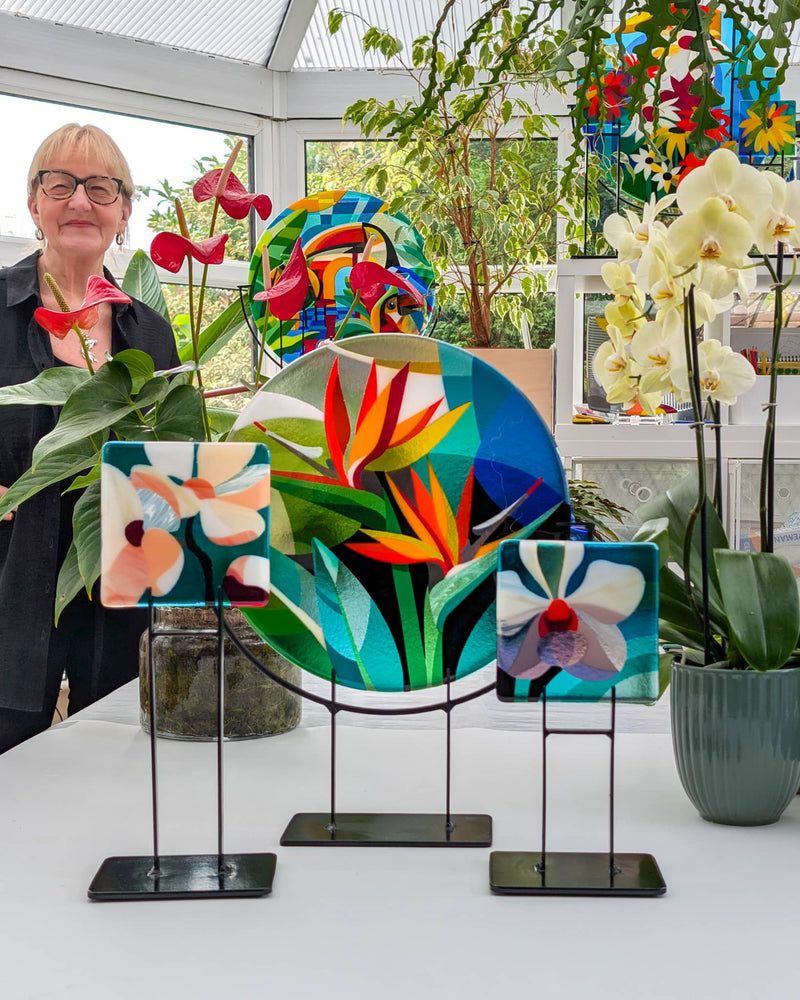 Linda Rossiter presenting the completed 'Strelitzia & Sakura' commissioned contemporary Hard Edge glass artwork with its matching Miniatures before delivery