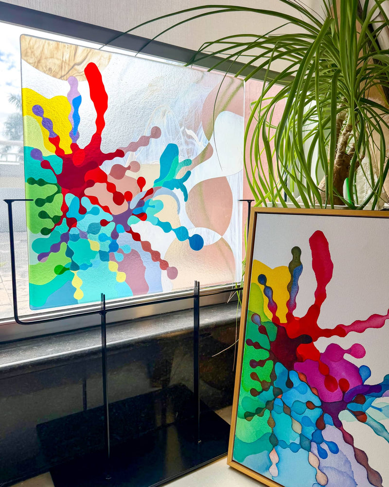 'Orchid Bloom' commissioned contemporary Hard Edge glass artwork by Linda Rossiter displayed on its custom stand beside the collector's original painting