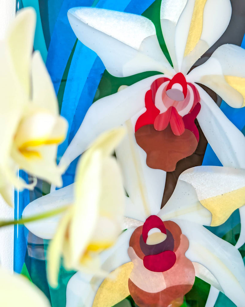 Close-up of 'Orchid' commissioned contemporary Hard Edge glass artwork showing individually cut glass pieces forming the orchid flowers