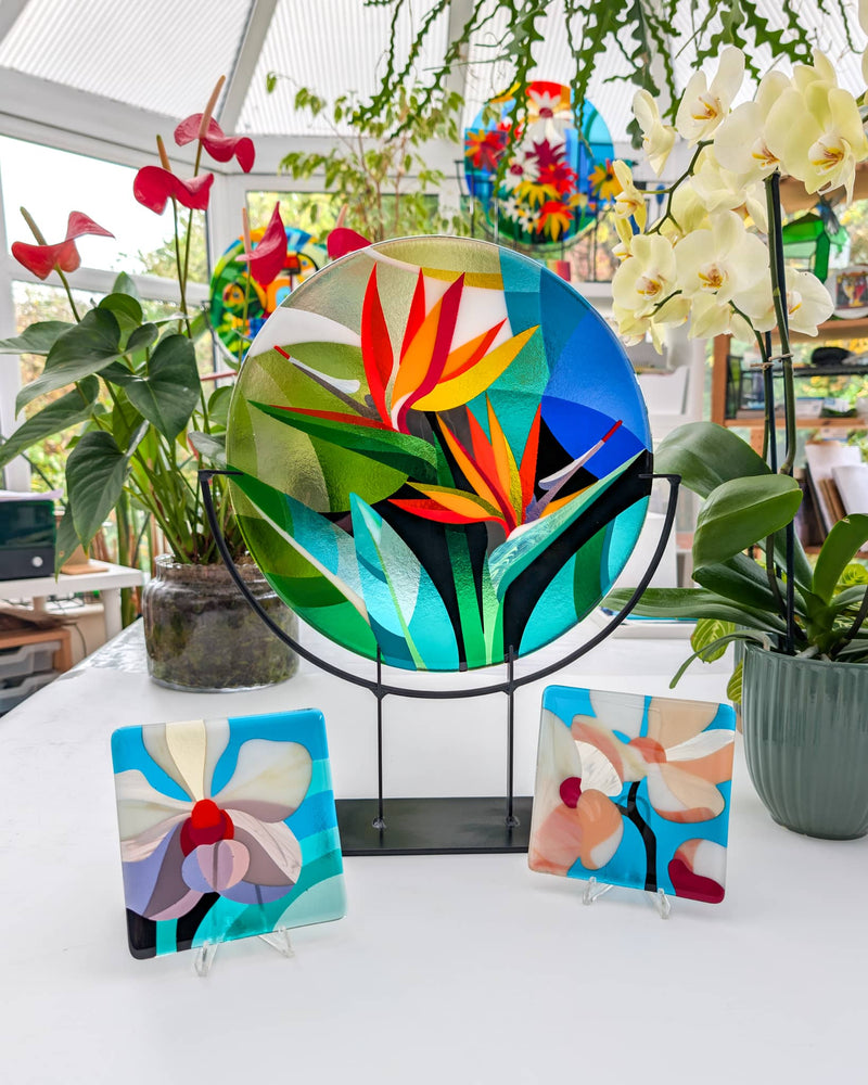 'Strelitzia & Sakura' commissioned contemporary Hard Edge glass artwork by Linda Rossiter with two matching Miniatures inspired by the collector's favourite flowers including birds of paradise, orchids and cherry blossom