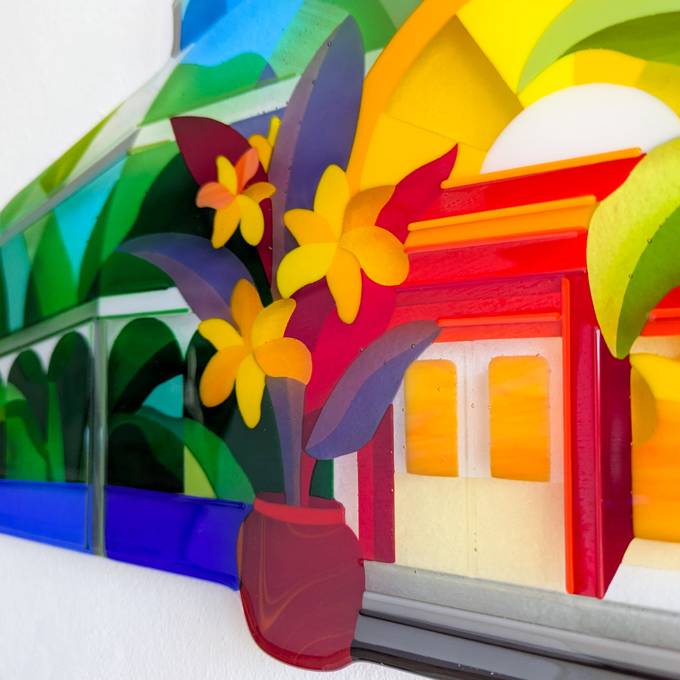 Close-up of 'Palm House' contemporary Hard Edge glass artwork showing the entrance, flowering plants and architectural detail of the Victorian glasshouse